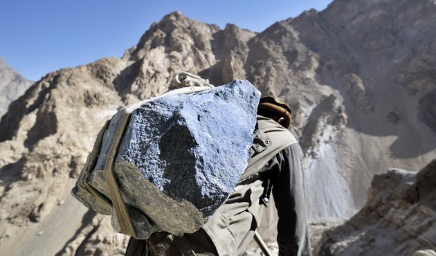 Lapis lazuli being carried across a mountain