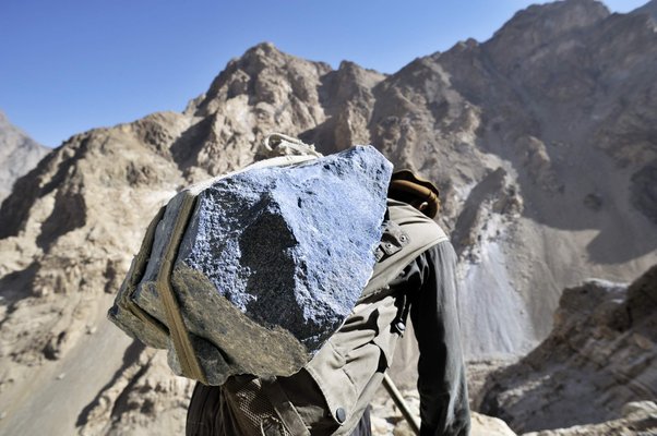 Lapis lazuli being carried across a mountain