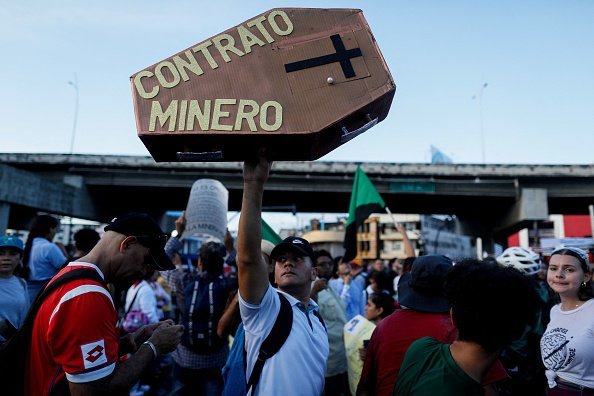 A demonstrator protests a controversial copper mining project in Panama City