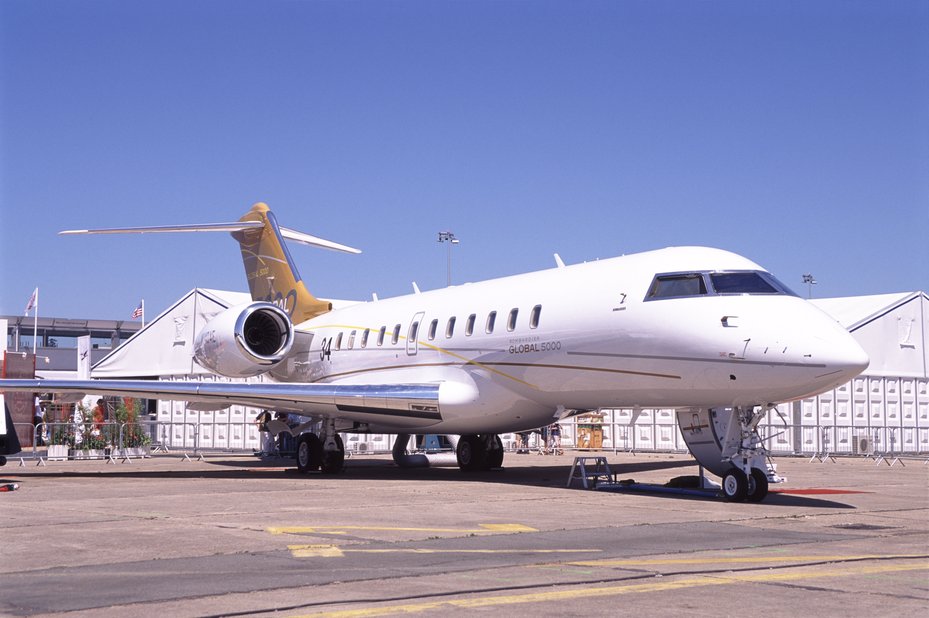 bombardier private jet sits on tarmac