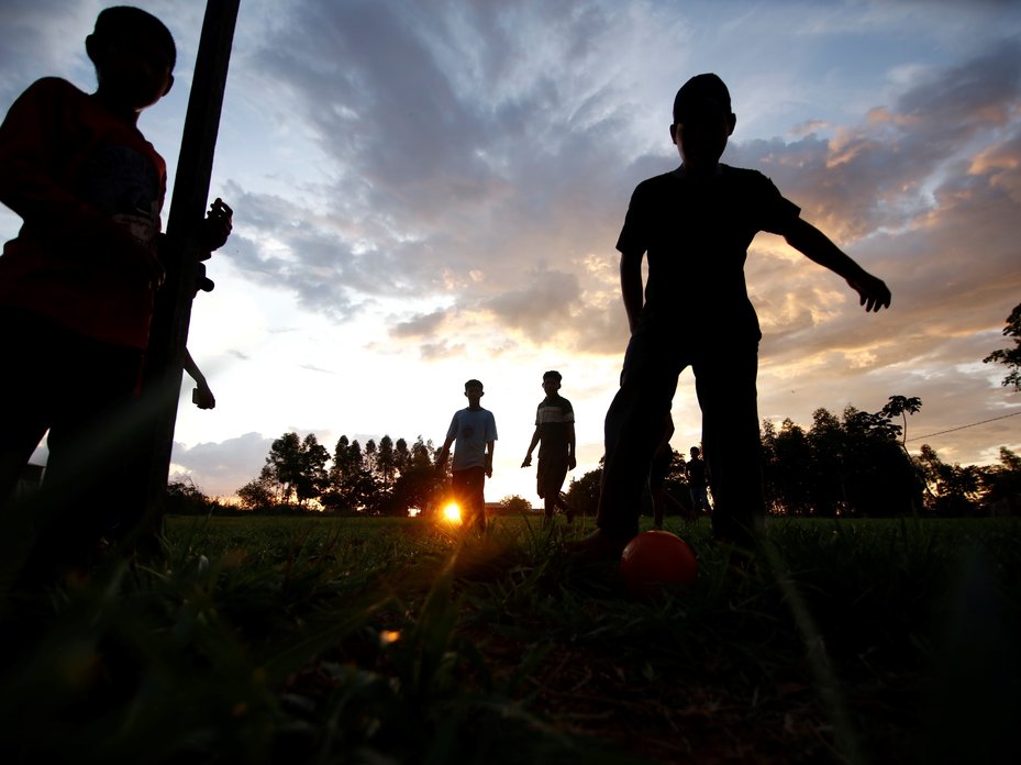 Ava Guaraní boys play football at Campo Agua'e, Paraguay