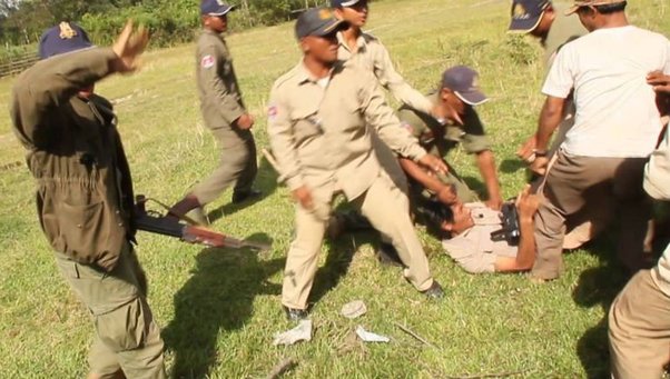 environmental defender Chut Wutty being attacked by Cambodian police