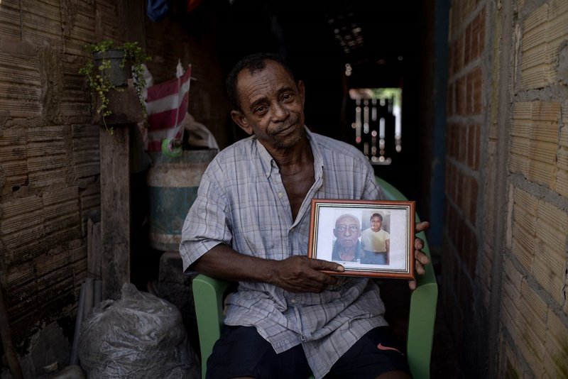 Raimundo Serrão, ARQVA Quilombola community leader, in his house in Vila Palmares, showing his ancestors who used to live where Agropalma’s farms are now located.