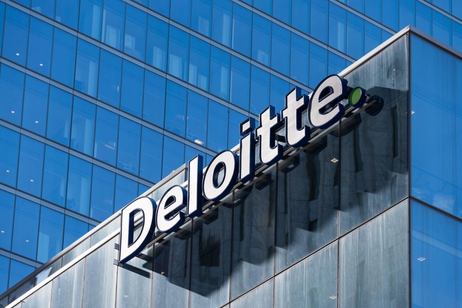 deloitte sign on glass building