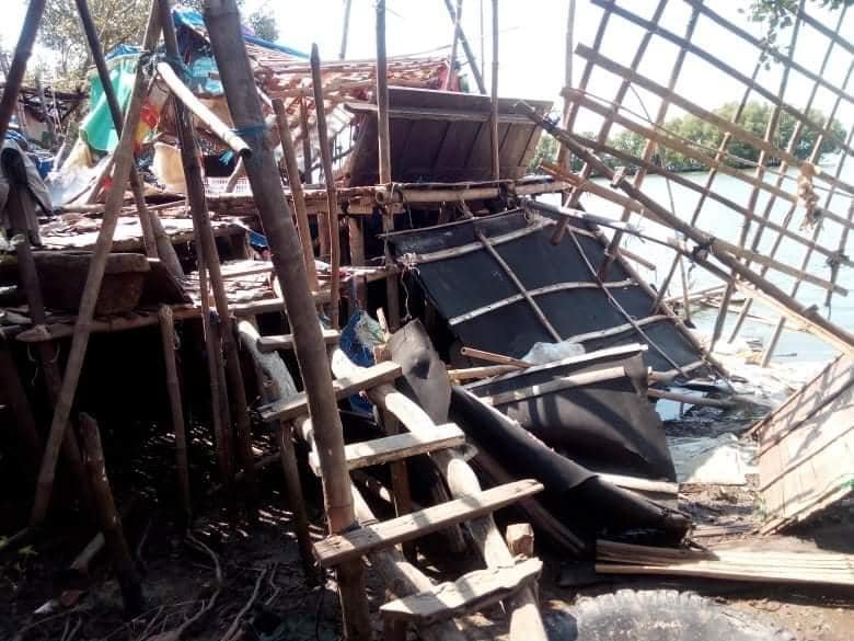 Community members in Taliptip demolish their own homes in exchange for financial compensation from San Miguel.