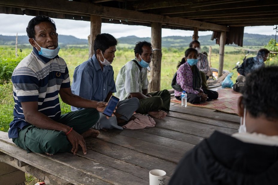 Families gather to discuss the ongoing case against Tate & Lyle in Koh Kong Province