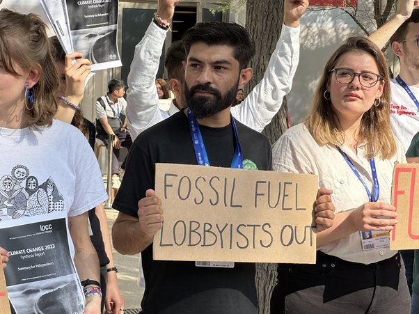 Action against the presence of fossil fuel lobbyists at COP28.