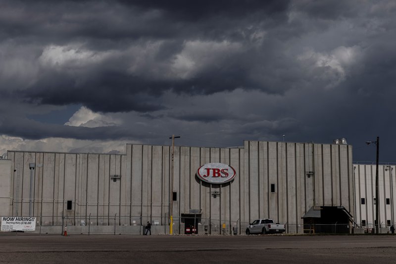 JBS plant against stormy background