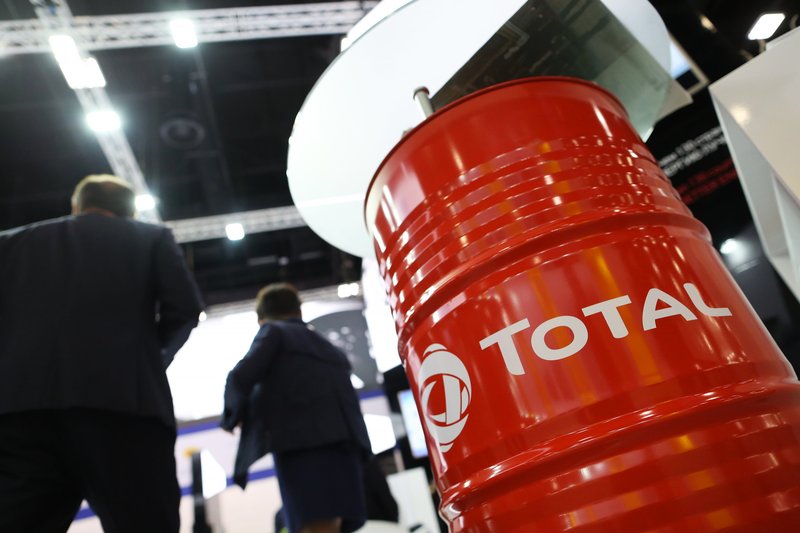 The logo of Total SA sits on an oil drum in the corporate hall at the St Petersburg International Economic Forum (SPIEF) in Saint Petersburg, Russia, on Thursday, May 24, 2018. The economic forum this year will be attended by President Vladimir Putin and