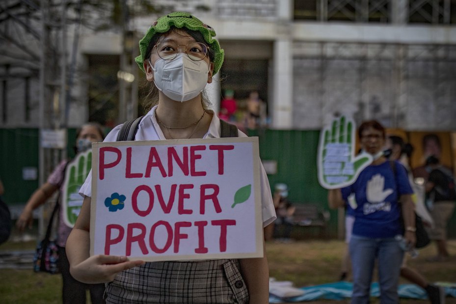 Defenders across the world are connected through the global climate movement, pressuring governments and industry to take action to address the causes and impacts of climate change. Ezra Acayan/Getty Images