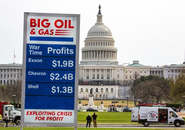 Banner showing war time profits in Washington D.C.