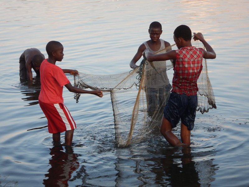 Boys fish in waters near Barra Vieja, on the northern coast of Honduras. Global Witness