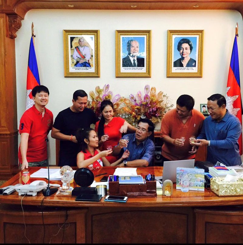 Hun Sen posts a picture of him and his children and chidlren-in-law in his office. Posted in response to the launch of Hostile Takeover on 7th July.