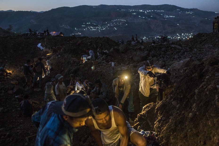 Small-scale miners working at a non-operational company mining site near Sa-Pot Maw, Hpakant, October 22, 2016.