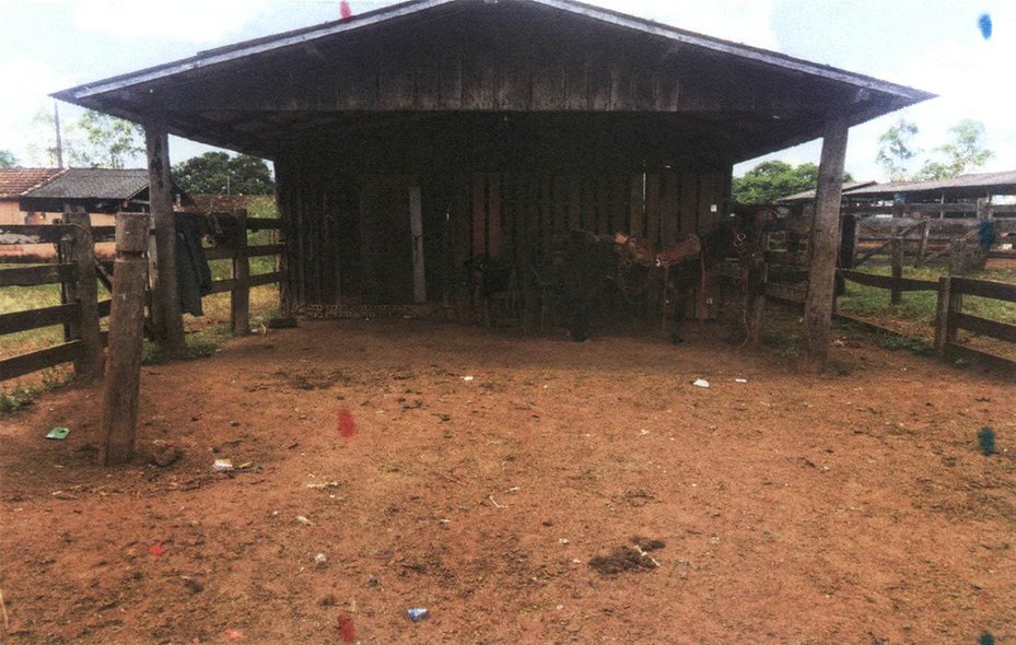 Photo of a barn where labourers allegedly slept with farm animals, from Brazil