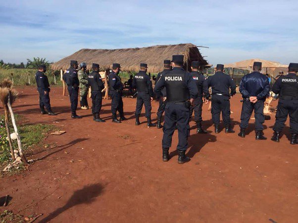 Police arrive en masse to enforce an illegal eviction of an Indigenous community in Paraguay