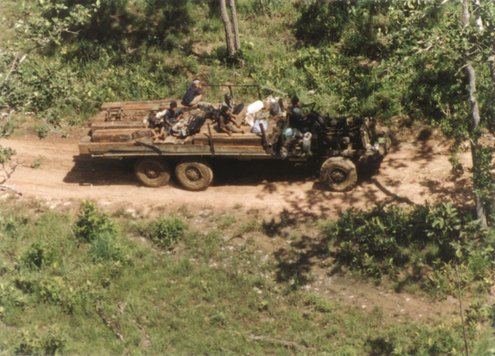 Soldiers escorting illegally-logged luxury timber, Phnom Aural Wildlife Sanctuary, Cambodia