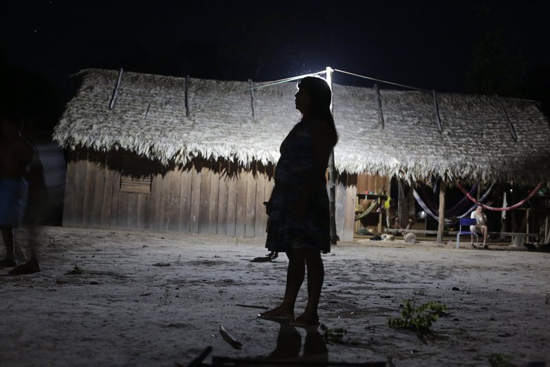 A member of an Indigenous community in Brazil facing threats from agribusinesses