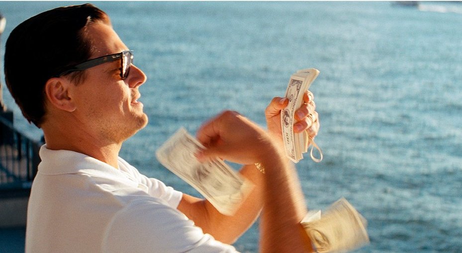 Leonardo diCaprio throws money into ocean in Wolf of Wall Street