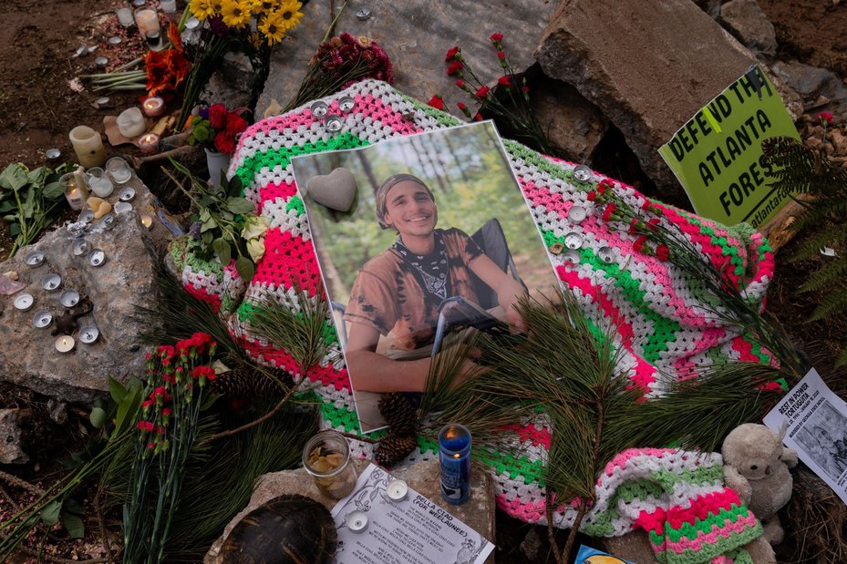 flowers for defender Manuel Paez Terán, who was killed by police gunfire during a peaceful protest