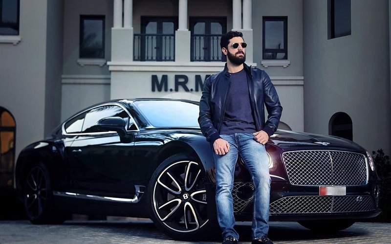 Mohammad Rami Makhlouf, is Rami Makhlouf’s eldest son, poses by expensive car