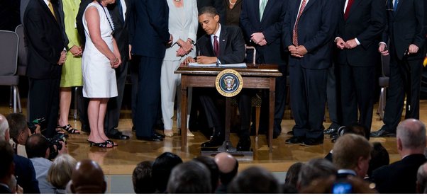 Obana signing the Dodd Frank Act