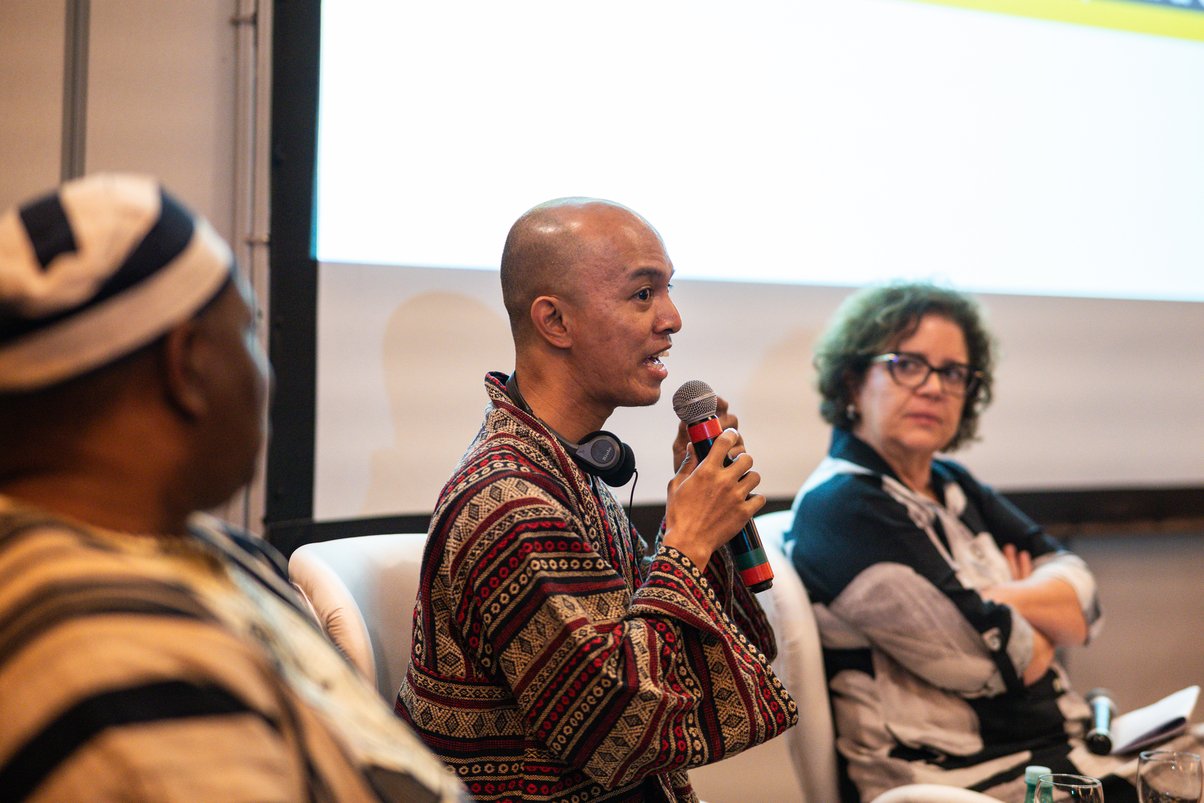 Paul Belisario talks at a Global Witness event in Brasilia, Brazil.