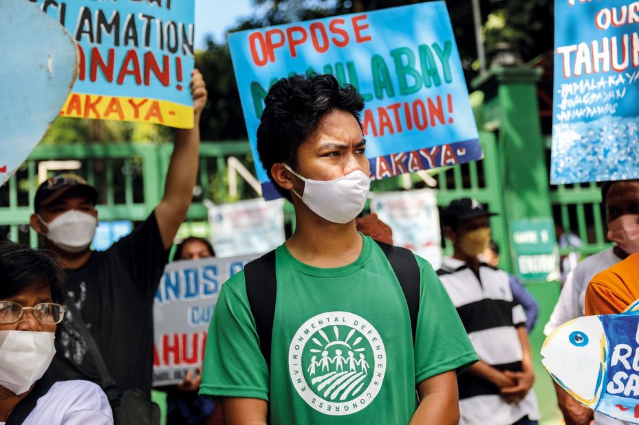 Jon Bonifacio, from the Kalikasan Peoples Network for the Environment, joins activists as they rally against the ongoing construction of a new international airport by San Miguel Corporation in Manila Bay, Philippines