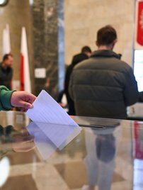 A man casts his ballot during the first round of the presidential elections on May 18, 2025 in Warsaw, Poland