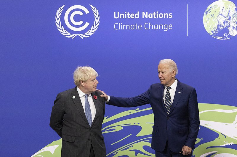 uk prime minister boris johnson and us president joe biden at cop26