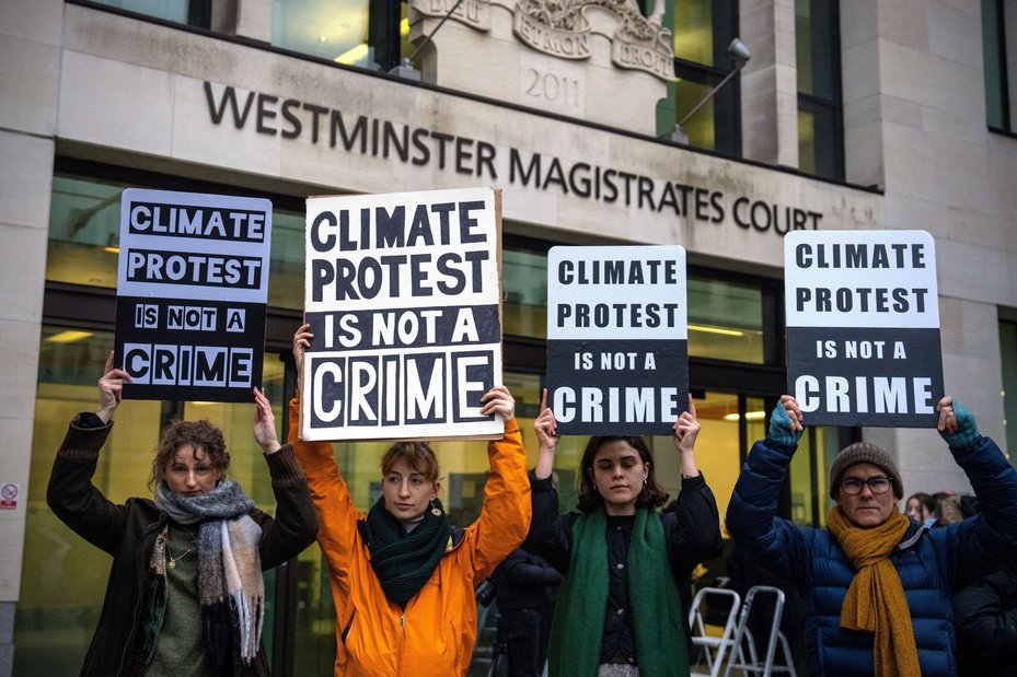 Protestors gather outside Westminster Magistrates Court in London