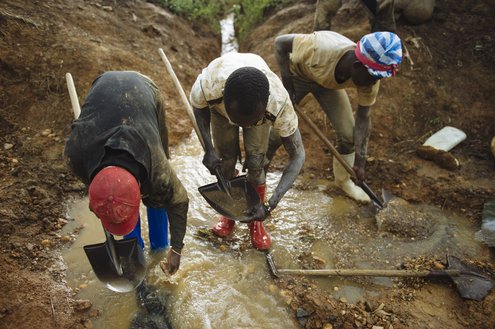 Artisanal miners pan for gold at the Mufa II gold mining site in South Kivu, in the east of the Democratic Republic of the Congo