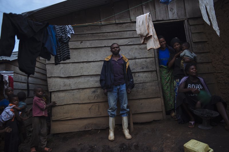 Miner outside his home in the mining town of Nzibira in South Kivu province