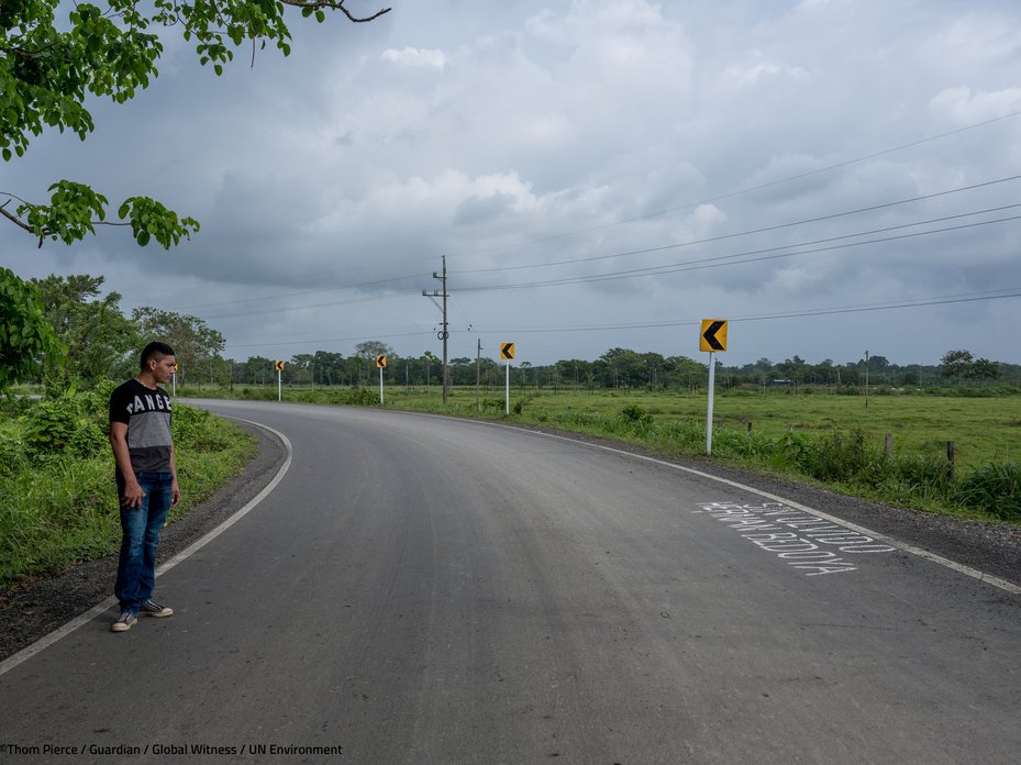 Ramon Bedoya at his father's roadside memorial. This is the exact spot where Hernan was murdered by a gunman on a motorcycle in December 2017.