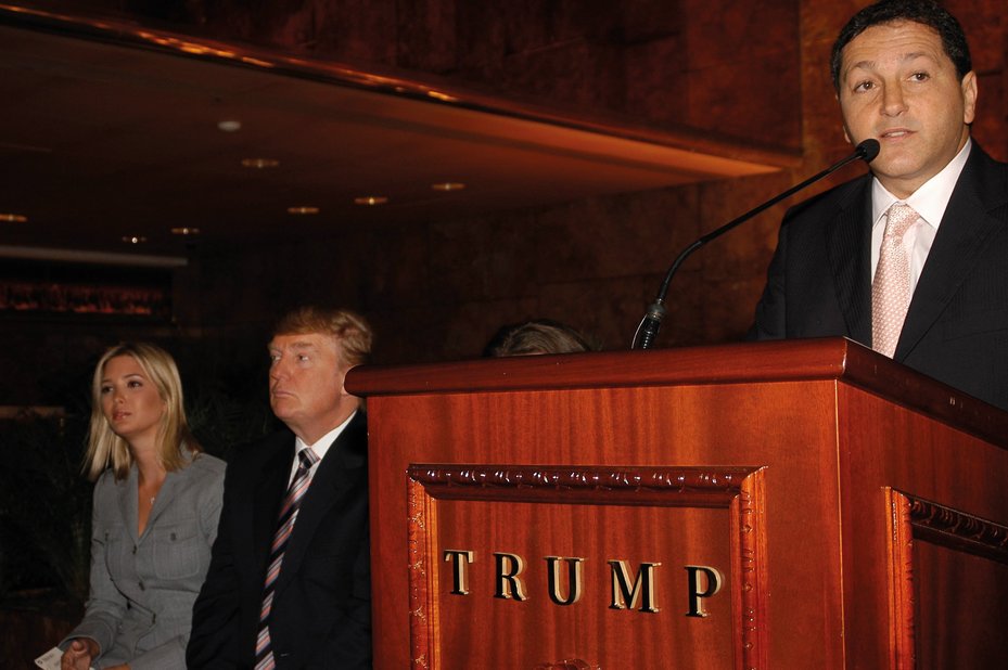 Panamanian businessman Roger Khafif makes speech while Donald Trump sits to the side