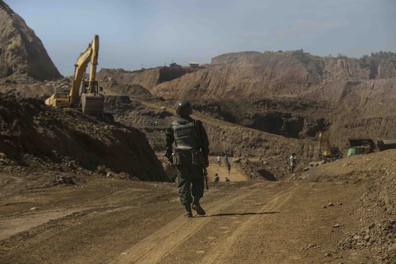 A Tatmadaw soldier guarding a jade company compound in Hpakant, Kachin State