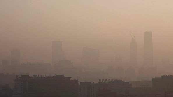 Thick smog hangs over Beijing's skyline in December 2015, when the Chinese government issued a three-day 