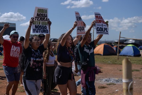 "They stole our land, they want to steal our future," read the placards brandished by students in Brazil. They are protesting the Marco Temporal land rights bill. Karina Iliescu / Global Witness