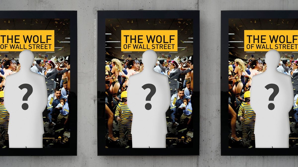 movie posters for wolf of wall street film hang on wall