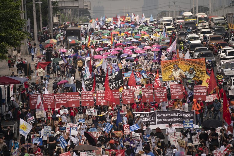 Various groups of Filipino people flock along Commonwealth Avenue urging the government and the newly elected President Marcos Jr. to take responsibility in ensuring that the lives of the Filipino people are improved