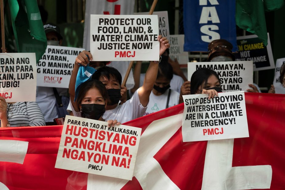 Volunteers from the Philippine Movement for Climate Justice gathered at the Department of Environment and Natural Resources