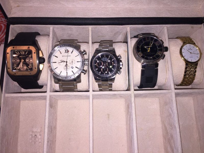 watches as part of police haul from candido Vaccarezza's house