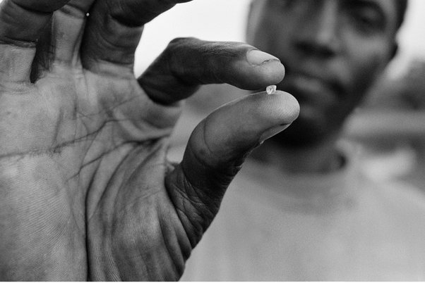 man holding a diamond