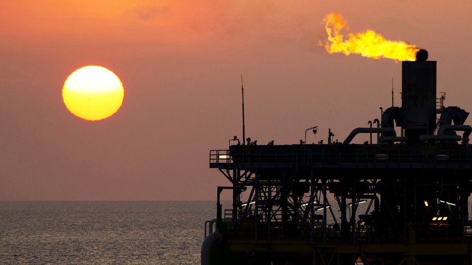 Gas flare on an oil rig in the ocean