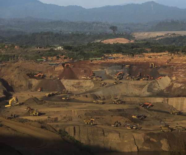 Machines are used to excavate jade in Hpakant on an enormous scale